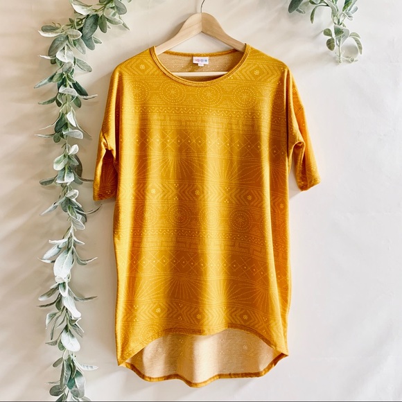 LuLaRoe Tops - LulaRoe | Yellow patterned Tunic Top